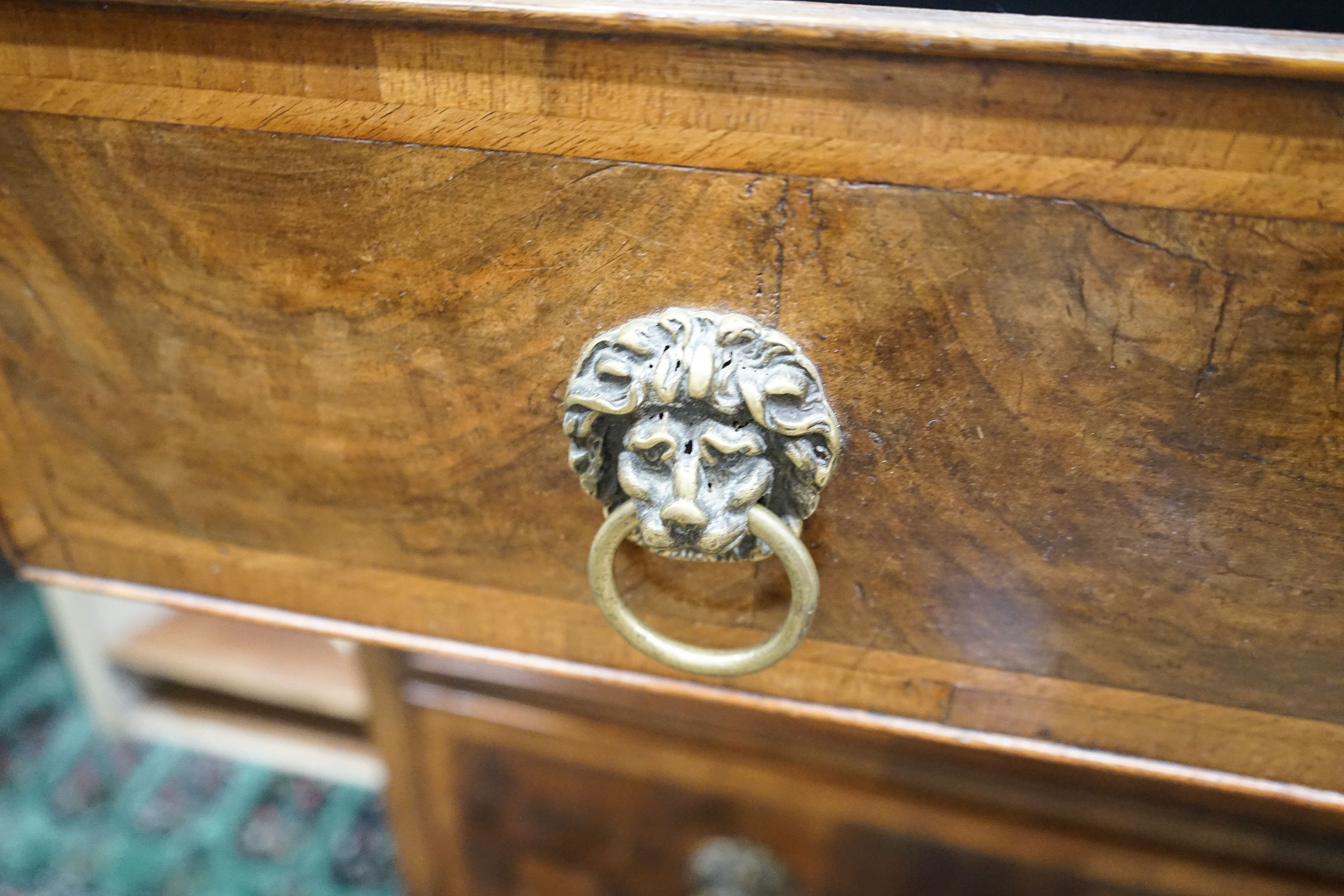 A walnut and oak chest of drawers, width 103cm, depth 52cm, height 82cm